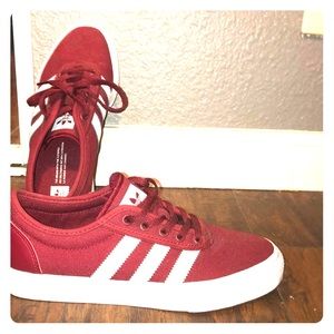 Burgundy and white adidas